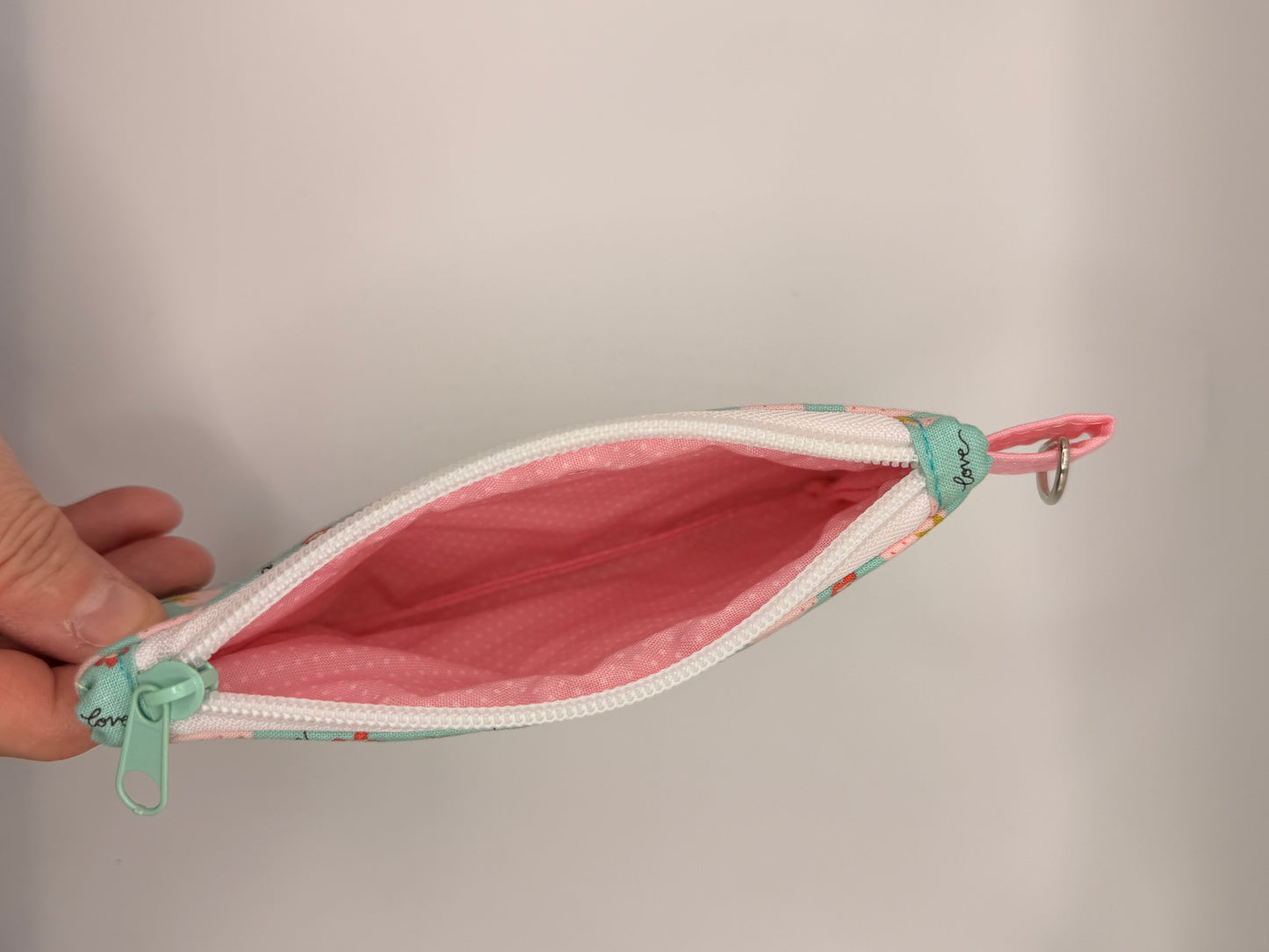 Pink strawberries on light blue background zipper wallet
