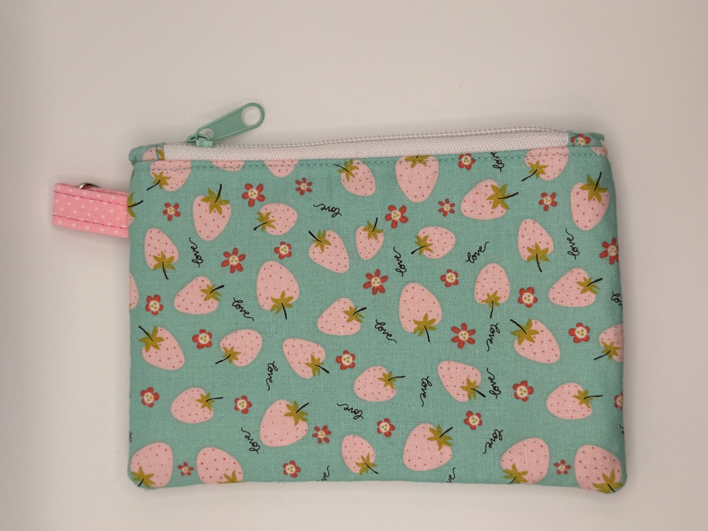 Pink strawberries on light blue background zipper wallet